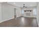 Cozy living room featuring hardwood floors, a fireplace, and natural light at 1729 Spring Ne St, Conyers, GA 30012