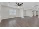 Spacious living room with hardwood flooring and modern ceiling fan at 1729 Spring Ne St, Conyers, GA 30012
