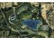 Aerial view of community and recreation area with walking paths and lakes at 243 Howell Sw Ter, Atlanta, GA 30331