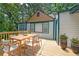 Inviting backyard deck featuring a dining set, perfect for outdoor entertaining and relaxation at 243 Howell Sw Ter, Atlanta, GA 30331