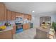 Bright kitchen featuring modern appliances, ample counter space, and an adjacent dining area at 243 Howell Sw Ter, Atlanta, GA 30331
