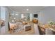 Inviting living room featuring hardwood floors, neutral decor, and plenty of natural light at 243 Howell Sw Ter, Atlanta, GA 30331