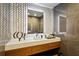 Modern bath with mosaic tile accent wall, floating vanity, and contemporary fixtures at 2525 Peachtree Ne Rd # 32, Atlanta, GA 30305