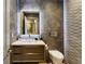 Stylish powder room featuring unique stone wall and modern fixtures at 2525 Peachtree Ne Rd # 32, Atlanta, GA 30305