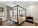 Comfortable bedroom with a canopy bed, neutral tones, and stylish decor, creating a relaxing atmosphere at 2525 Peachtree Ne Rd # 32, Atlanta, GA 30305