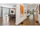 Bright dining room with wood floors, modern lighting, and access to outdoor area at 2525 Peachtree Ne Rd # 32, Atlanta, GA 30305