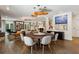 Spacious dining area offering seamless entertaining between kitchen, dining, and living spaces at 2525 Peachtree Ne Rd # 32, Atlanta, GA 30305