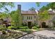 Charming home exterior featuring a brick walkway, manicured landscaping, and an elegant entrance at 2525 Peachtree Ne Rd # 32, Atlanta, GA 30305