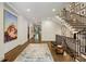 Open foyer with a wooden staircase, modern lighting, and neutral decor that create an inviting ambiance at 2525 Peachtree Ne Rd # 32, Atlanta, GA 30305