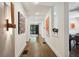 Spacious hallway with wood floors and recessed lighting leads to front door and other living areas at 2525 Peachtree Ne Rd # 32, Atlanta, GA 30305
