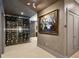 Elegant hallway with a wine cellar view, gray walls, modern lighting, and sophisticated decor at 2525 Peachtree Ne Rd # 32, Atlanta, GA 30305