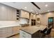 Gourmet kitchen boasts custom cabinets, stone countertops, and stainless-steel appliances at 2525 Peachtree Ne Rd # 32, Atlanta, GA 30305