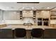 Modern kitchen features stainless steel appliances, large island with bar seating, and custom cabinetry at 2525 Peachtree Ne Rd # 32, Atlanta, GA 30305