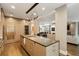 Modern kitchen island is a focal point, with seating and a seamless transition to living spaces at 2525 Peachtree Ne Rd # 32, Atlanta, GA 30305