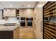 Custom kitchen features high-end appliances including double ovens and a sleek wine refrigerator at 2525 Peachtree Ne Rd # 32, Atlanta, GA 30305