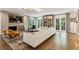 Spacious living room featuring a fireplace, large TV, comfortable seating, and ample natural light at 2525 Peachtree Ne Rd # 32, Atlanta, GA 30305
