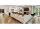 Expansive living room featuring a modern design, stylish decor, hardwood floors, and an open layout at 2525 Peachtree Ne Rd # 32, Atlanta, GA 30305
