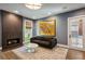 Cozy living room features a modern fireplace, neutral paint and trim, and stylish decor at 2525 Peachtree Ne Rd # 32, Atlanta, GA 30305