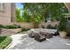 Serene outdoor patio with fire pit and ample seating for relaxation and entertaining at 2525 Peachtree Ne Rd # 32, Atlanta, GA 30305