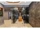 Impressive wine cellar with glass enclosures, extensive storage, and a central display area at 2525 Peachtree Ne Rd # 32, Atlanta, GA 30305