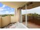 Balcony overlooking treeline with access to living room at 1501 Clairmont Rd # 1024, Decatur, GA 30033
