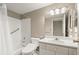 Bright bathroom featuring a shower-tub combo and a modern single sink vanity at 1501 Clairmont Rd # 1024, Decatur, GA 30033