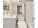 Bathroom featuring white cabinets, toilet, and a shower at 1501 Clairmont Rd # 1024, Decatur, GA 30033