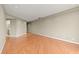 Spacious living room featuring hardwood floors and neutral paint at 1501 Clairmont Rd # 1024, Decatur, GA 30033