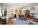 Classic dining room with hardwood floors and traditional furnishings at 2098 Dundee Se Dr, Smyrna, GA 30080