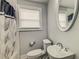 Bathroom view showcasing a white sink, toilet, bathtub and shower at 2569 Northview Ave, Decatur, GA 30032