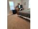 Bedroom with a wooden dresser, tv, and large windows at 2569 Northview Ave, Decatur, GA 30032