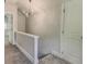 Upstairs hallway with neutral walls and carpet and modern lighting at 2569 Northview Ave, Decatur, GA 30032