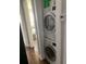View of a modern, stacked washer and dryer in the laundry area at 2569 Northview Ave, Decatur, GA 30032