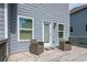 Outdoor deck with cozy seating offers a relaxing space for enjoying the fresh air at 3540 Lindsy Brook, Douglasville, GA 30135