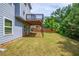 Enjoy the private backyard with a deck, lush lawn, and mature trees at 3540 Lindsy Brook, Douglasville, GA 30135