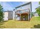 Spacious backyard featuring a wooden deck and lush green lawn perfect for outdoor enjoyment at 3540 Lindsy Brook, Douglasville, GA 30135