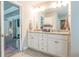 Bright bathroom with a double sink vanity and tile flooring at 3540 Lindsy Brook, Douglasville, GA 30135