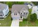 Two-story home with brick facade, well-maintained lawn, and a convenient two-car garage at 3540 Lindsy Brook, Douglasville, GA 30135