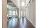 Spacious foyer with hardwood floors, a seating area, and high ceilings with decorative lighting at 3540 Lindsy Brook, Douglasville, GA 30135