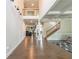 Grand foyer with hardwood floors, high ceilings, and an open staircase leading to the second floor at 3540 Lindsy Brook, Douglasville, GA 30135