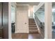 Foyer area showcasing staircase, hardwood floors, and ample lighting at 3540 Lindsy Brook, Douglasville, GA 30135