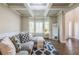 Inviting living room area featuring large windows and dark wood flooring at 3540 Lindsy Brook, Douglasville, GA 30135