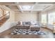 Spacious living room featuring coffered ceilings and bay windows at 3540 Lindsy Brook, Douglasville, GA 30135