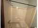 Enclosed shower with plastic surround and basic shower head at 1789 Riverridge Nw Dr, Conyers, GA 30012