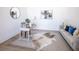 Bright office space with stylish decor, comfortable seating, and a decorative rug at 2425 Peachtree Nw Rd # 1802, Atlanta, GA 30305