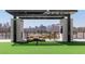 Inviting outdoor lounge featuring modern furniture, shade structure, and city views at 2425 Peachtree Nw Rd # 1802, Atlanta, GA 30305