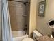 Bathroom featuring a tiled shower and vanity at 8440 Woodland Brooke Trl, Cumming, GA 30028