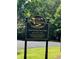 Close-up of the Chief Rising Fawn Park community sign at 8440 Woodland Brooke Trl, Cumming, GA 30028