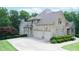 Charming brick home with a spacious driveway and a convenient two-car garage at 8440 Woodland Brooke Trl, Cumming, GA 30028