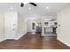 Hardwood floors in the living room provide an open view of the kitchen at 1661 Barrett Nw Dr, Atlanta, GA 30318